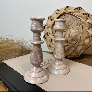 Pair of Carved Pink and Beige Marble Candlesticks.